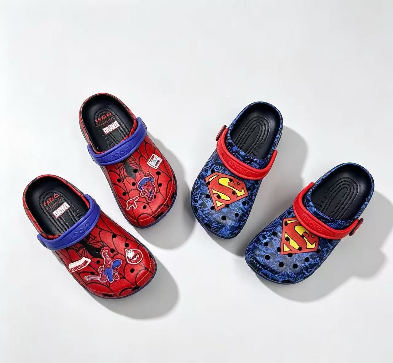 Spider web and blue hero graphic kids clog shoes